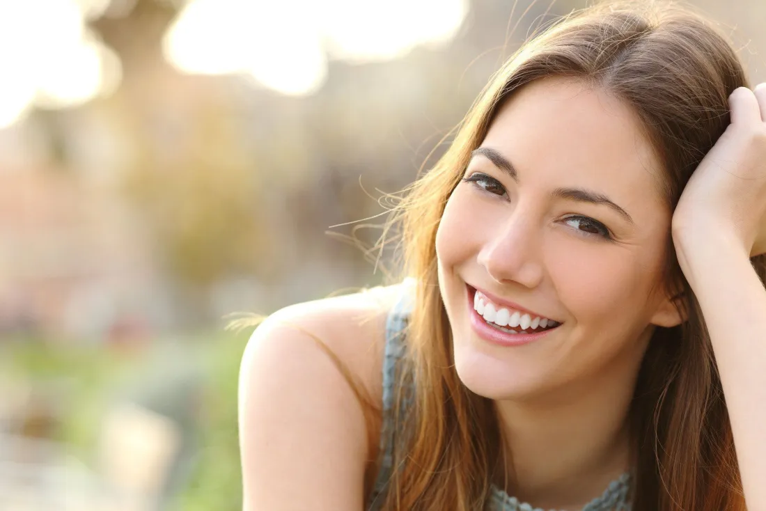 A patient smiling after dental care